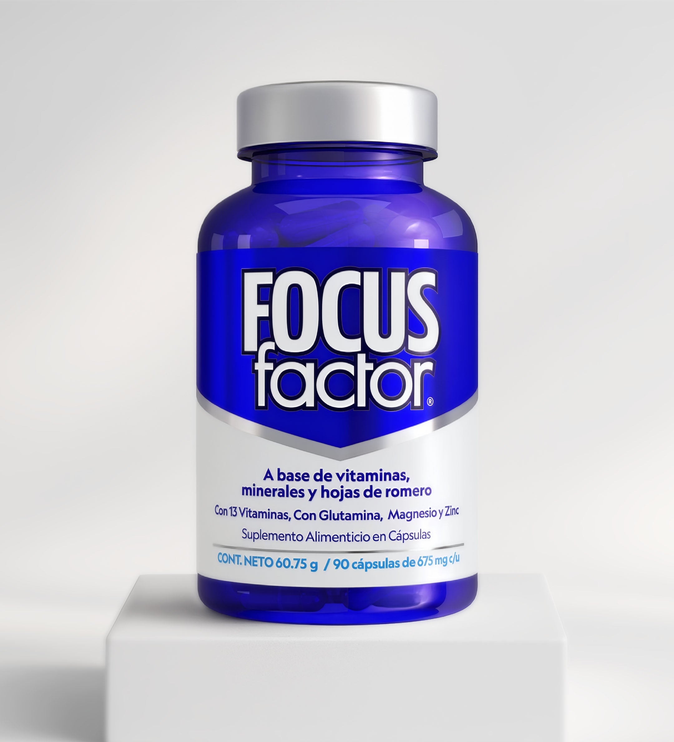 A blue bottle of Focus Factor® Vitaminas y Minerales with Spanish label highlights vitaminas, minerales, romero, glutamina, magnesio y zinc para apoyar memoria y concentración. Contiene 90 cápsulas.
